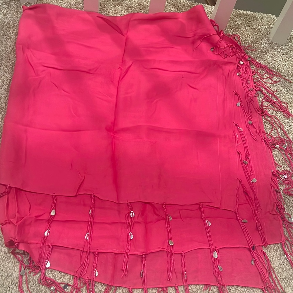 Gently used hot pick scarf with silver sparkle and tassel detail